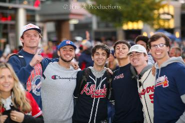 Group of Fans Smile at Braves Watch Party