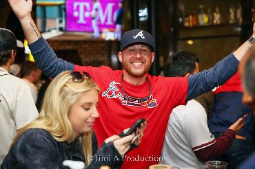 Excited Braves Fan in Bar