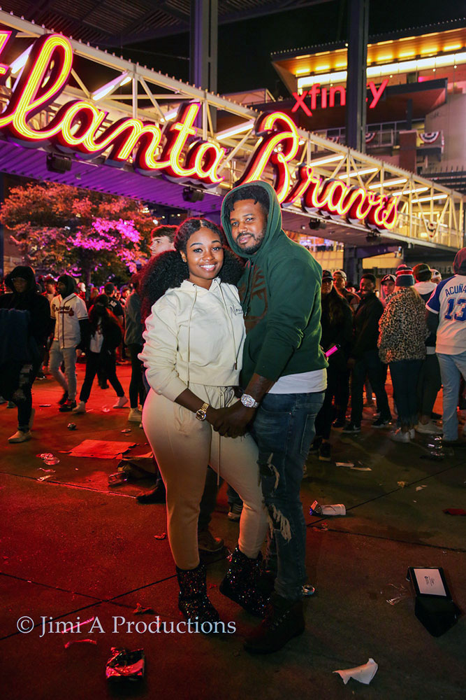 Couple poses in Braves Country