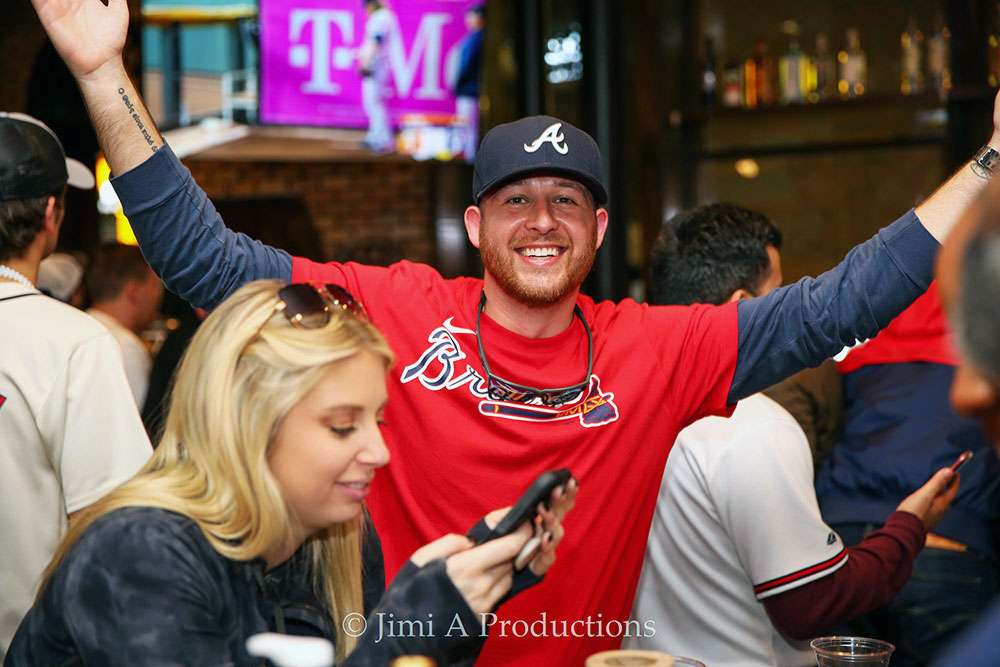 Excited Braves Fan in Bar