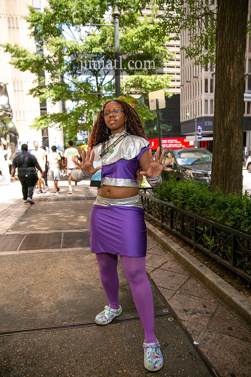 Woman in Purple Costume