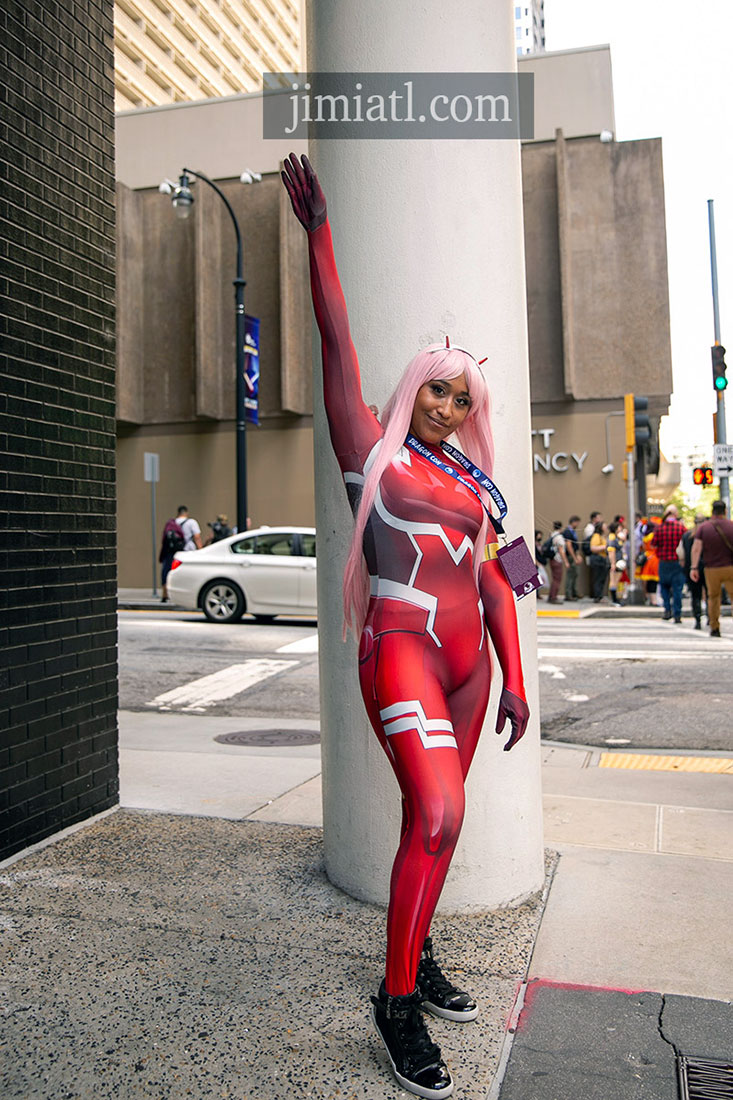 Woman in Red Costume Reaches