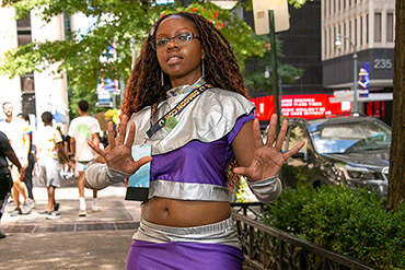 Woman in Purple Costume