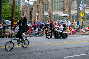 Excited Bicyclist at Dragon Con Parade